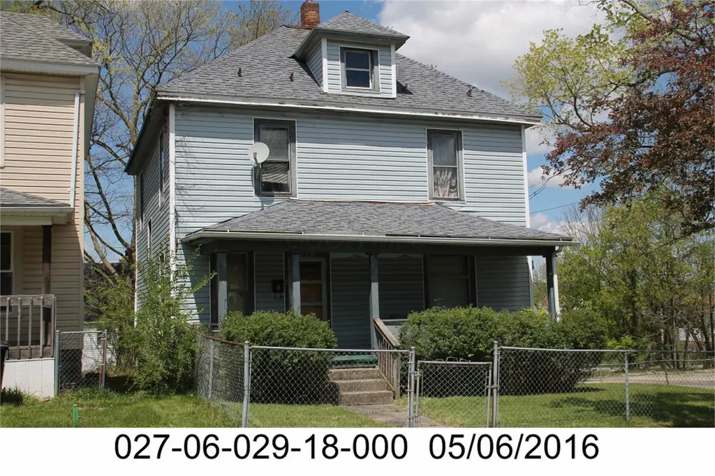 163 E 1st St